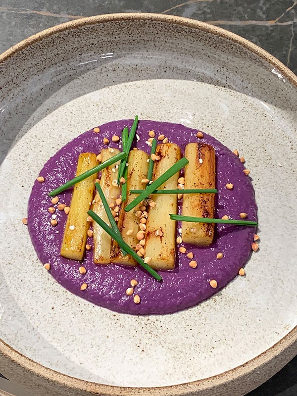 Baked salsify, red cabbage-apple sauce, grilled buckwheat