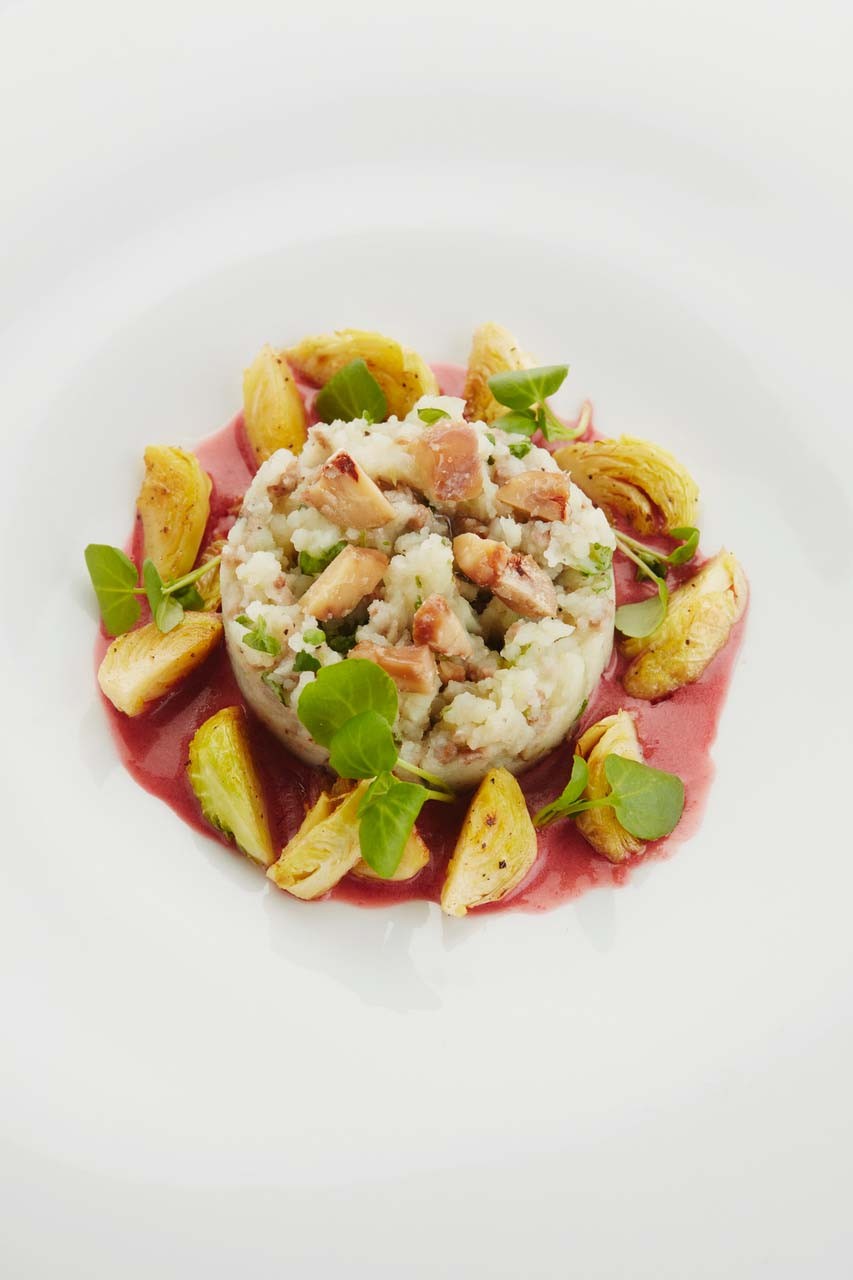 Stir-fried Brussels sprouts, mashed potatoes with watercress, pan-fried venison mince and roasted chestnuts