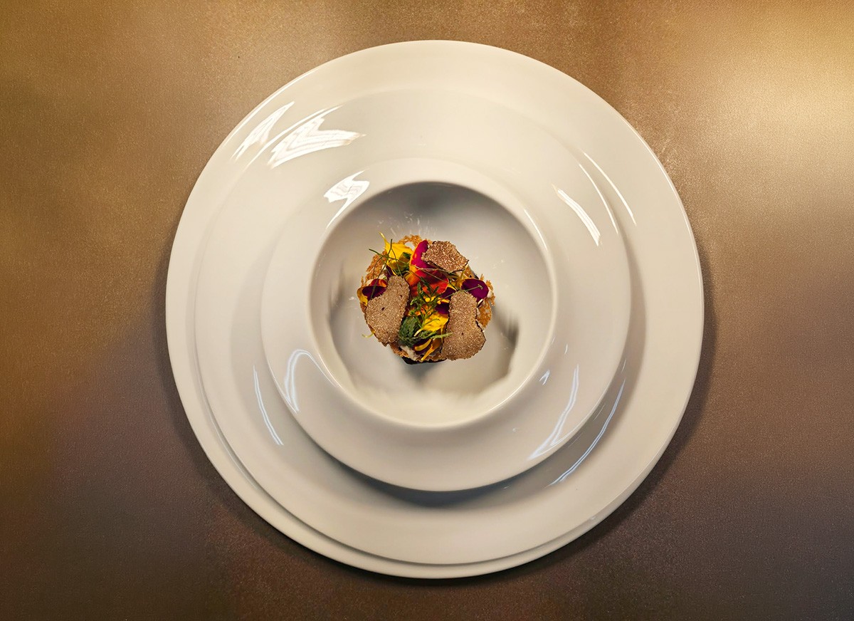 Pan-fried and glazed aubergine, aubergine caviar, pomegranate, fresh herbs from the kitchen garden, oriental vinaigrette with toasted sesame. 