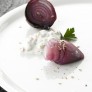 Grilled red onion with spicy fresh cheese sauce