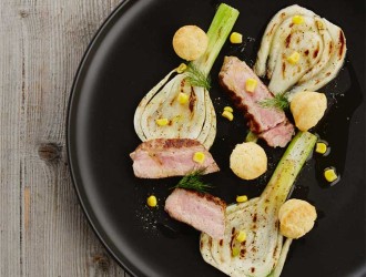 Baked veal oyster on grilled fennel with corn cake and liquorice drops