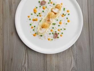 Cauliflower croquettes with paprika drops, pan-fried rabbit cutlet with peas, lemon & rosemary. 